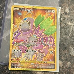 Pokemon Oranguru Trading Card - Gold and Green